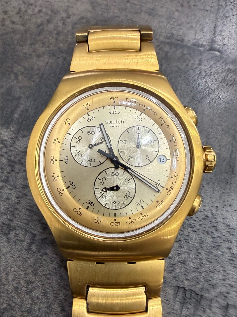 Swatch Gold Tone Chronograph Bracelet Watch/Battery not included.